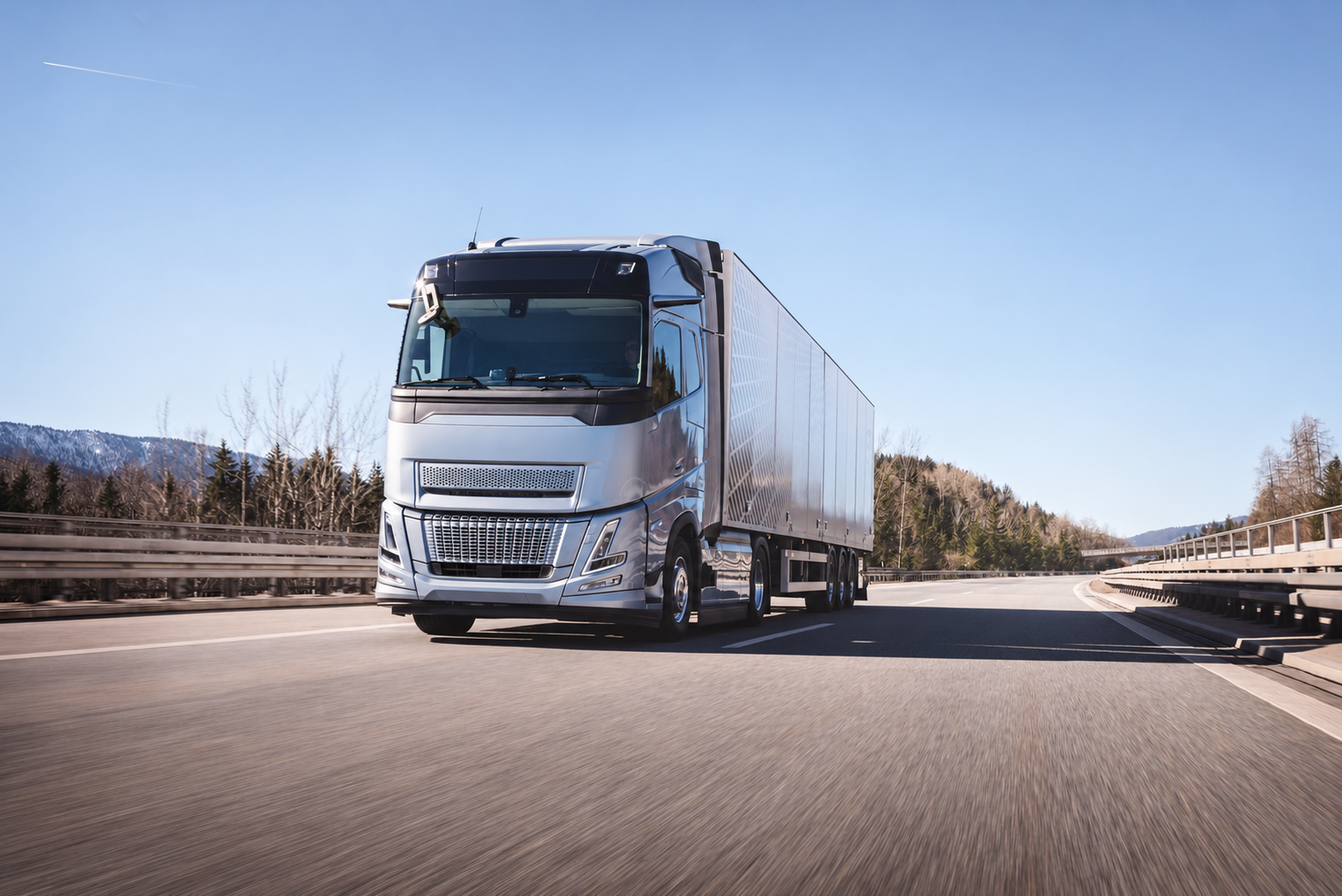 A commercial truck travelling on a highway